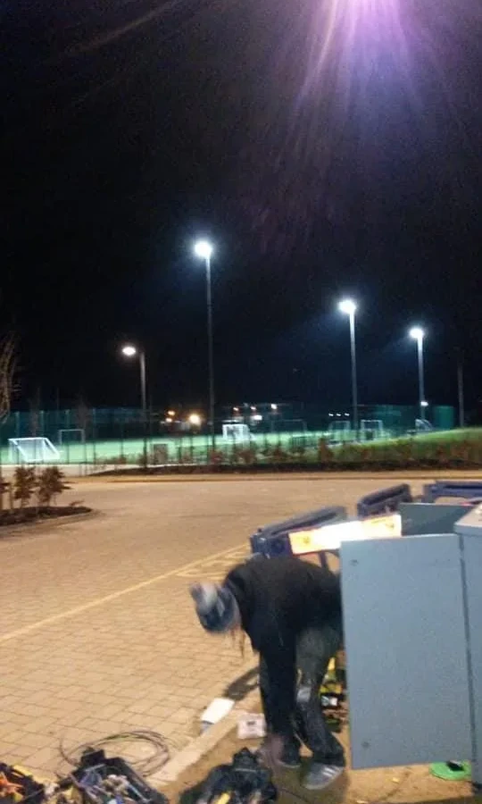 Working at a car park lighting feeder pillar after dark