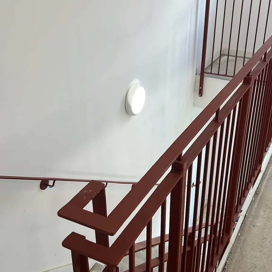 Bulkhead light in a communal stairwell