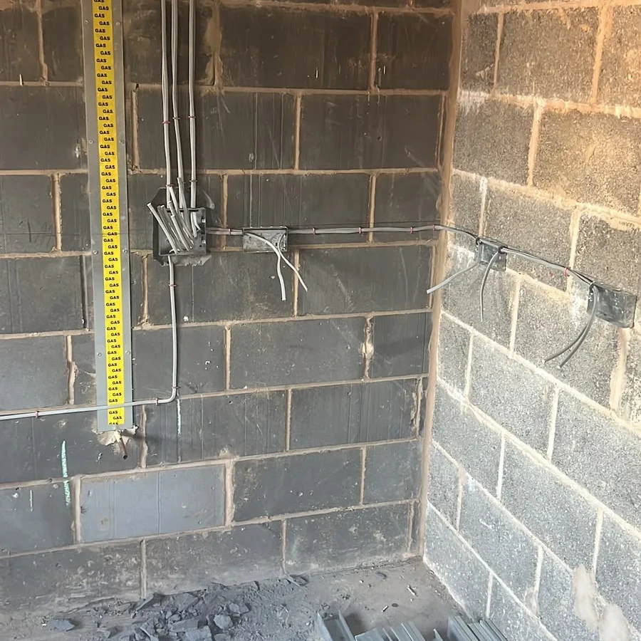 Setting socket and switch heights during a first fix